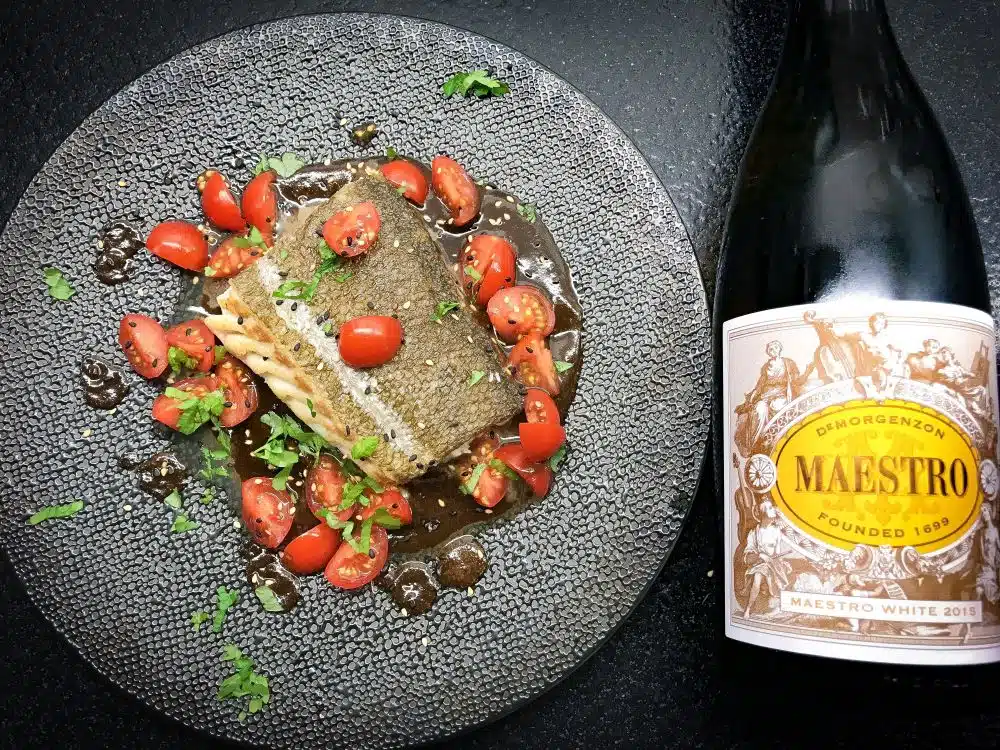 skrei met zwarte knoflooksaus en kerstomaatjes
