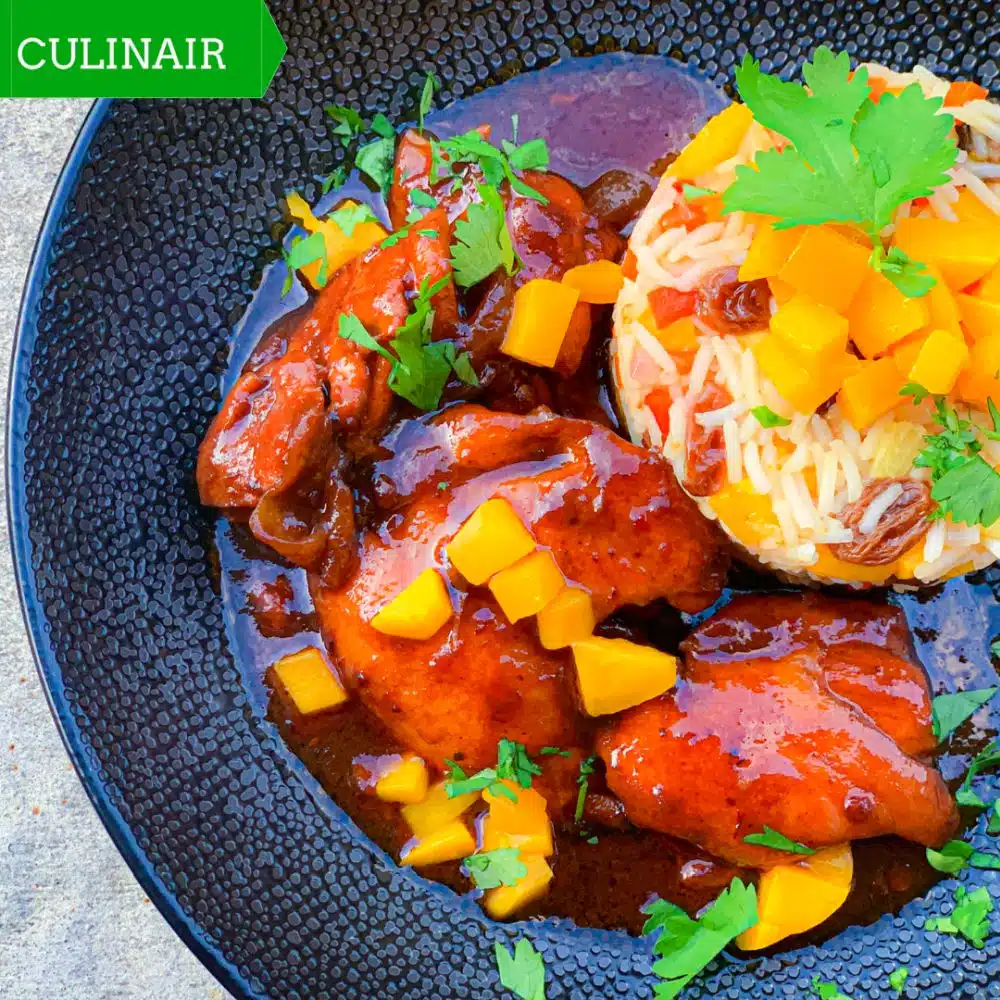 Chipotle-rum kip met romige Caraïbische mango-kokos rijst