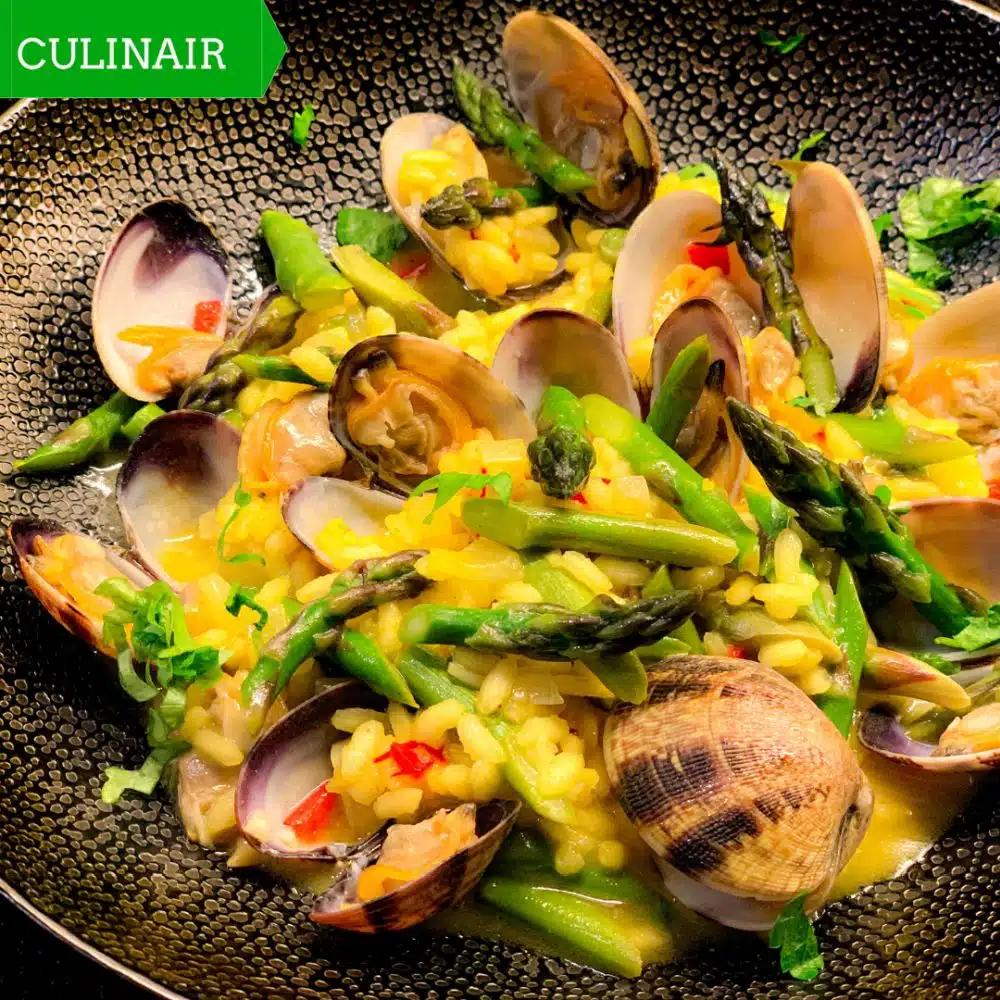 Risotto met vongole saffraan groene asperges en citroen