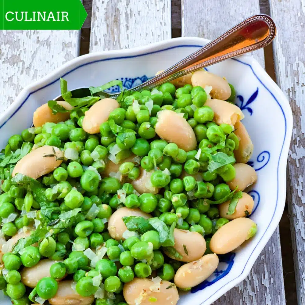 Lauwwarme salade van doperwtjes en witte bonen