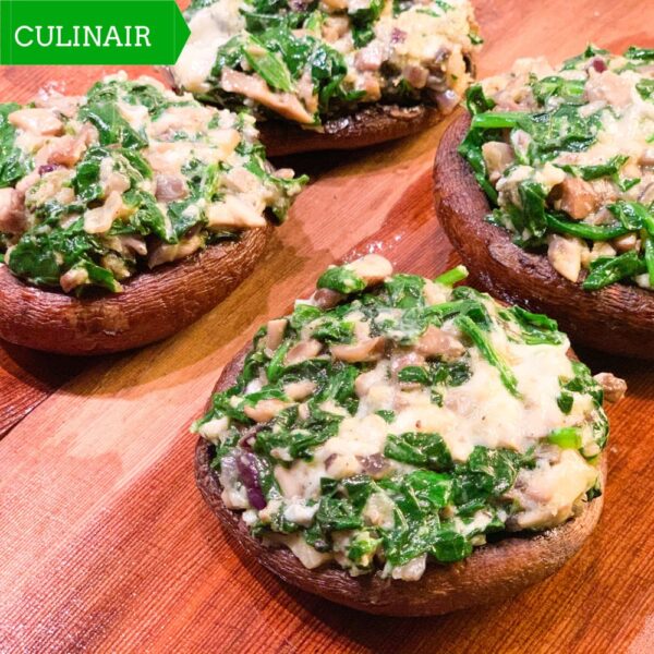 Gevulde portobello’s met spinazie en Roquefort van de cederhouten ovenplank Vinissima