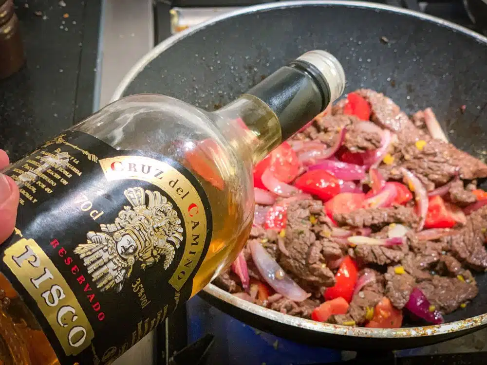 Lomo saltado met pisco Lomo saltado met pisco