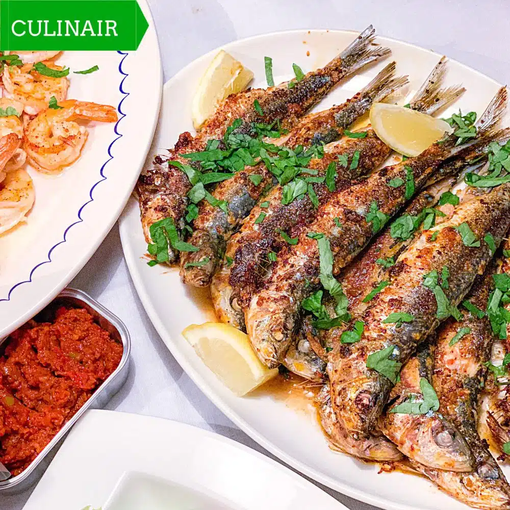 Knoflookgarnalen en gegrilde sardientjes op Portugese wijze