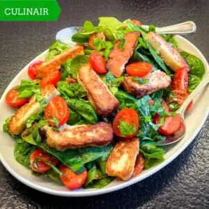 Spinaziesalade met tomaat en gegrilde halloumi