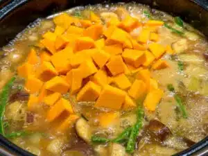Stap 6 samlor korkor – kabocha pompoen toevoegen