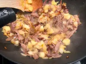 parmentier maken met confit de canard appel cider en Calvados