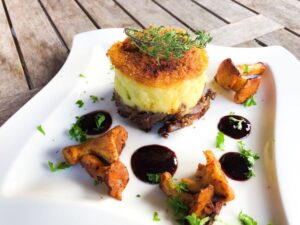 parmentier met eend en paddenstoelen