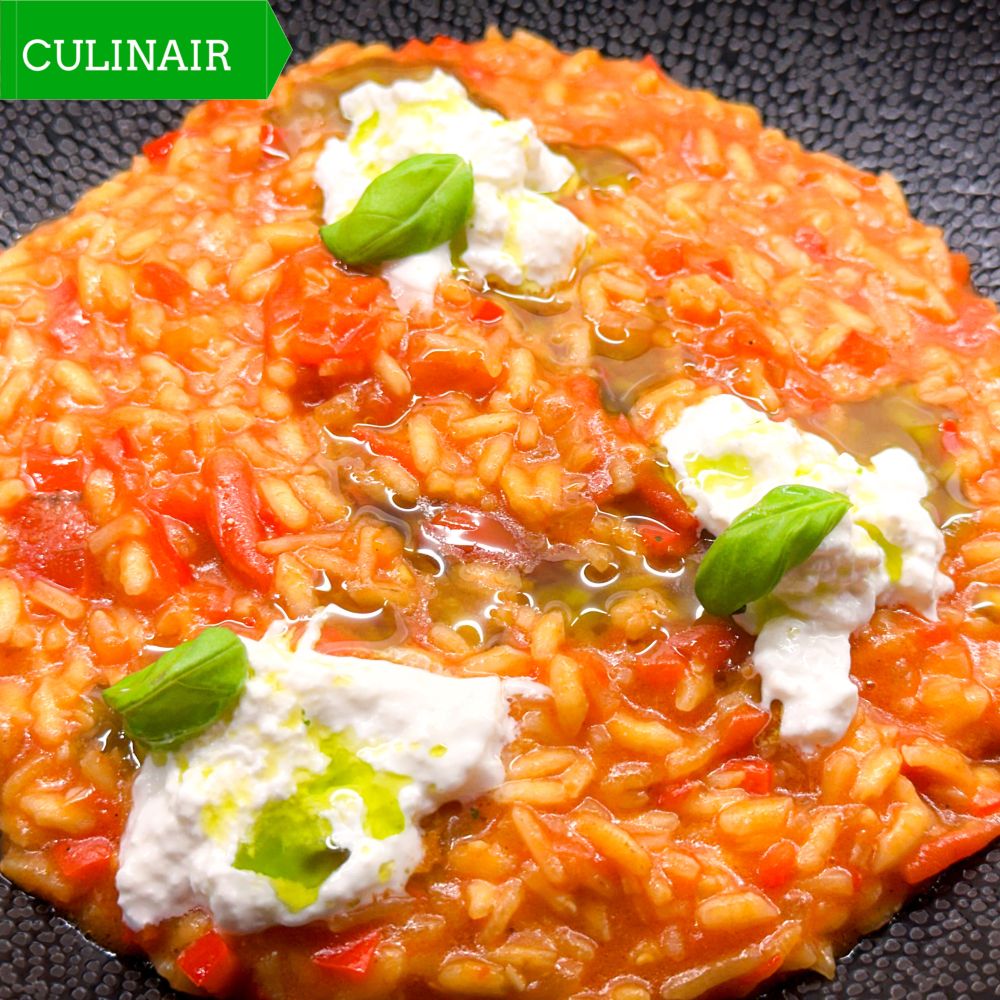 Tomatenrisotto met burrata en basilicumolie